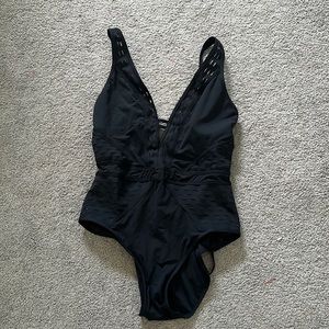 Becca large one piece never worn